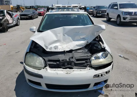 2009 Volkswagen Rabbit из США, поврежденный, VIN WVWAA71K89W043117